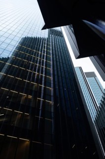 Modern abstract reflections in glass fronted office buildings in the financial district of the