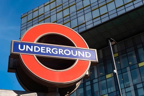 London, United Kingdom. October 10th 2023 Iconic British Underground Tube Sign against modern