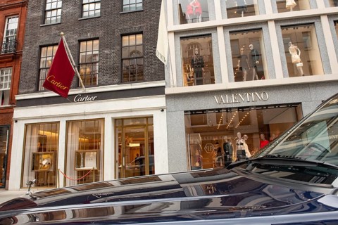 United Kingdom. August 2nd 2023 A Rolls Royce Bentley parked in front of Cartier and Valentino