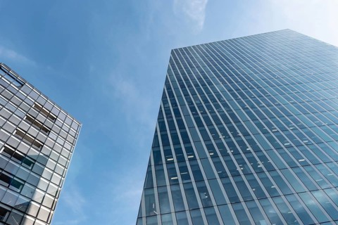 Modern high rise glass fronted British architecture, a business district on the south bank of the