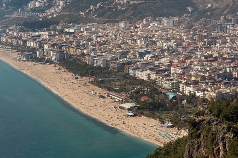 Aerial landscape view of houses and property in Alanya city set on the slopes the Taurus Mountains
