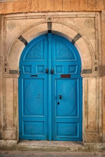 Detailed blue ornate design of a typical door in the Medina of Tunis, a UNESCO designated quarter
