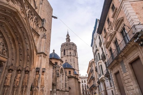 Valencia cathedral with its miguelete tower dominating the skyline, featuring ornate gothic
