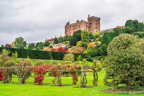 Autumn colors over Powis Castle and Garden, Welshpool, Powys, Wales, UK