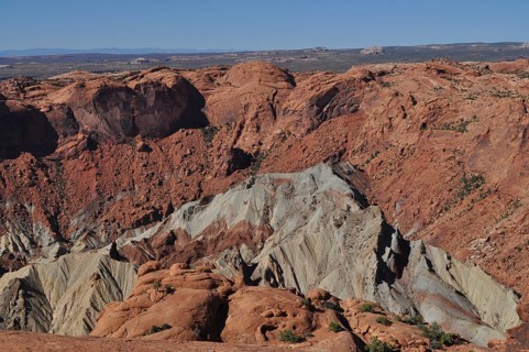 View of impressive red rock formations in a deep canyon, Canyonlands National Park, Island in the