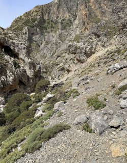 Erosion on rocky rocky mountainsides of eroded rocks with risk of rockfall landslide, international