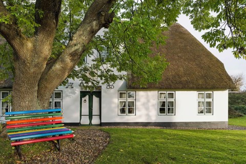 Colored pencil bench in front of Friesenhaus Sylt Germany