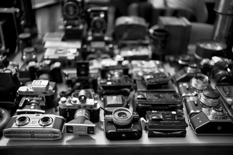 Photographica, old photo equipment, cameras, lenses, display, black and white, photo exchange,