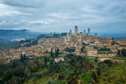 A captivating aerial view of San Gimignano, the historic hilltop town in Tuscany, Italy, famed for