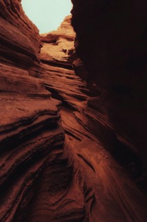 Striking volcanic landscape of Lanzarote, featuring rugged canyon formations with layered rock