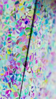 This image features a visually striking 3D rendered illustration of colorful, multifaceted