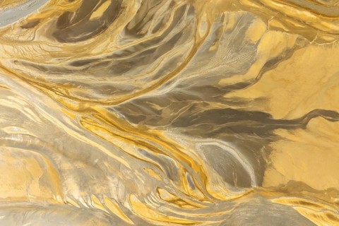 This image showcases a captivating abstract texture with flowing patterns resembling a marble