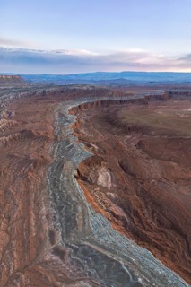 Stunning aerial view of Caineville Mesa in Utah, USA, showcasing vibrant layers of sedimentary rock