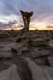 A captivating rock formation in Bisti De-Na-Zin Wilderness, New Mexico, USA, bathed in the warm