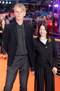 Grant Gee, Janine Marmot on the Red Carpet in front of the closing gala of the 76th Berlinale at