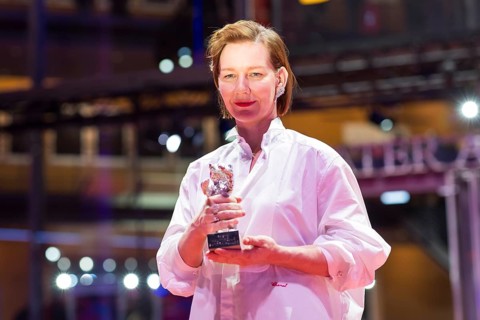 Sandra Hüller poses with the Silver Bear for the best acting performance in a leading role in the