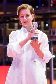 Sandra Hüller poses with the Silver Bear for the best acting performance in a leading role in the