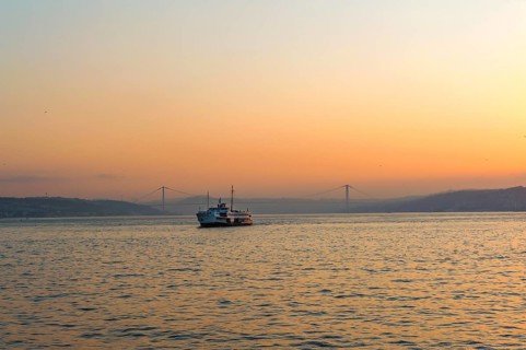 Istanbul, Turkey. Beautiful misty sunrise over the Bosporus, with the European and Asian shores as