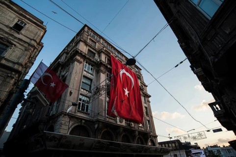 Istanbul, Turkey. July 2rd 2016 Turkish flag hanging from a European style building in the Beyoglu