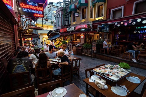 Istanbul, Turkey. July 17th 2023 Nightlife with bars and diners eating at restaurants in Balik