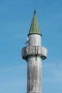 Istanbul, Turkey. 29th November 2020 Simple wooden minaret of old Turkish mosque, the call to
