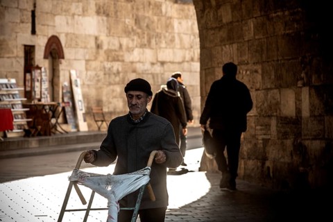 Istanbul, Turkey. November 21st 2023 A Turkish worker pushes a trolley cart near the Egyptian