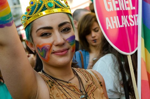 Istanbul, Turkey. 28th June, 2015 A young Turkish woman with rainbow face paint celebrates Gay