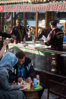 Istanbul, Turkey. April 12th 2016 A Turkish couple eating a fish sandwich the famous street food