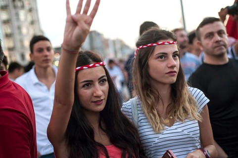 Istanbul, Turkey. July 18th 2016. Turkish pro government supporters gather in Takism square after