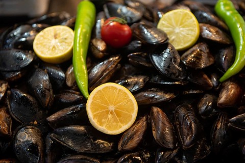 Istanbul, Turkey. November 30th 2020 Midye, Traditional Turkish stuffed mussels for sale on a