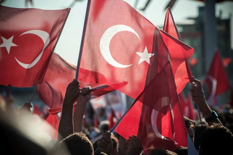 Taksim Square, Istanbul, Turkey. July 24th 2016 Turkish flag waving supporters after the Akp