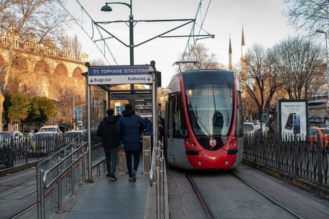 Istanbul, Turkey. December 25th 2021 Commuters catching a tram at Tophane station near Karakoy on