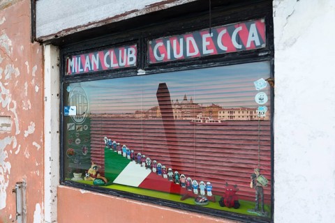 Reflection of Venice in the window of the Milan soccer club on the island of Giudecca, Veneto,
