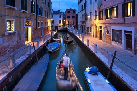 Gondolas in the evening in a side canal in the Dorsoduro district, Venice, Veneto, Italy