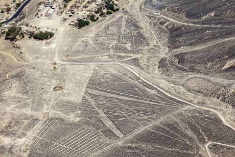 Desert landscape with visible Nazca lines seen from above in Peru, The geoglyphs and images in the