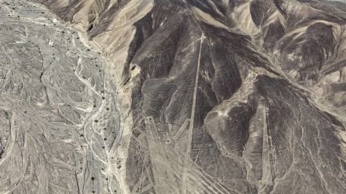 Desert landscape with visible line formations and elevations, the geoglyphs and images in the