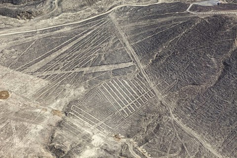 View of famous line formats in the Nazca Desert, viewed from the air in Peru, The geoglyphs and