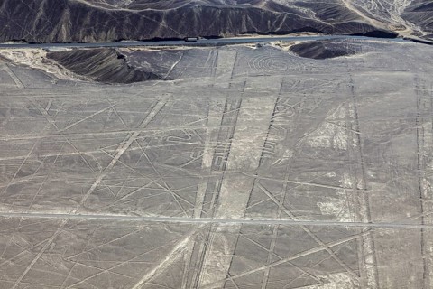 View of lines and patterns on a sandy, dry surface, the geoglyphs and drawings in the desert near