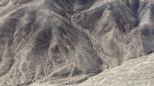 Rocky hills in a desert-like area with incised lines, the geoglyphs and drawings in the desert near