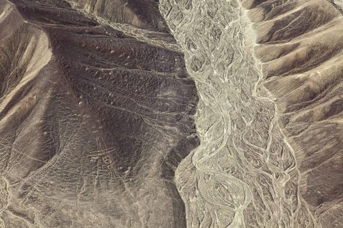 Hilly desert landscape with visible ancient lines from the air, the geoglyphs and paintings in the