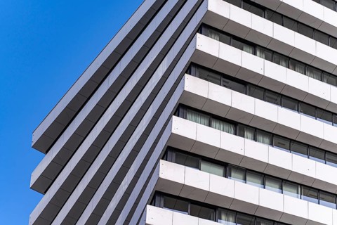 From below image captures the essence of modern architecture through the details of a building's