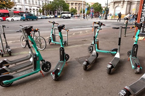 Budapest, Hungary. October 1st 2023 A group of Swap rental scooters parked on the pavement in