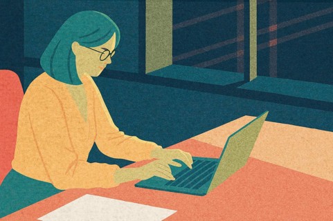 A business professional is focused on tasks at a laptop in a contemporary office The setting is