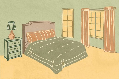 A cozy bedroom featuring a comfortable bed, a bedside lamp, and large windows. The warm color