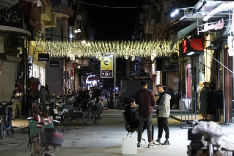 Syrians shop at the historic Al-Hamidiyah Bazaar adjacent to the Umayyad Mosque during the early