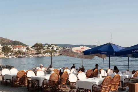 Bodrum, Turkey. April 23rd 2022 Turkish restaurant on the beach of Bodrum harbour, a popular