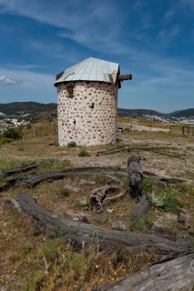 One of the partially restored Bodrum Windmills, overlooking Gumbet bay and Bodrum Marina, a local