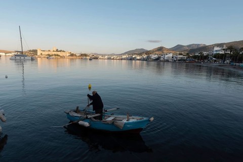 Bodrum, Mugla, Turkey. April 21st 2022 A fisherman at dawn in the beautiful harbour of Bodrum on