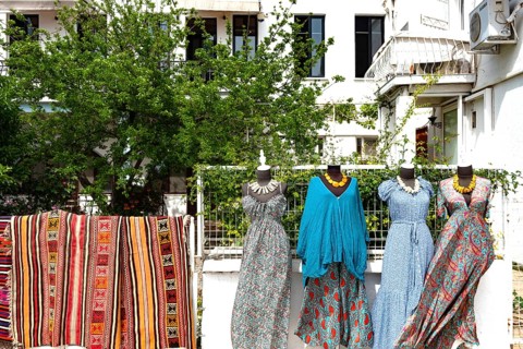 Bodrum, Mugla, Turkey. April 21st 2022 Colourful carpets and pretty dresses for sale on the street