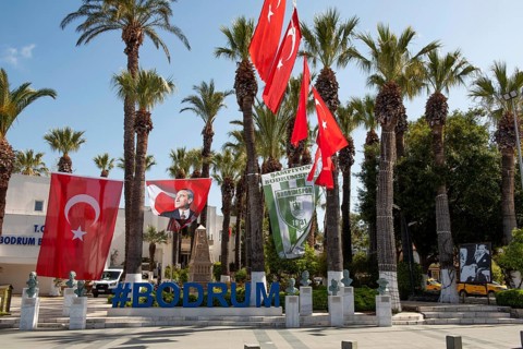 Bodrum, Mugla, Turkey. April 21st 2022 Hash Tag Bodrum city centre sign under Turkish flags and